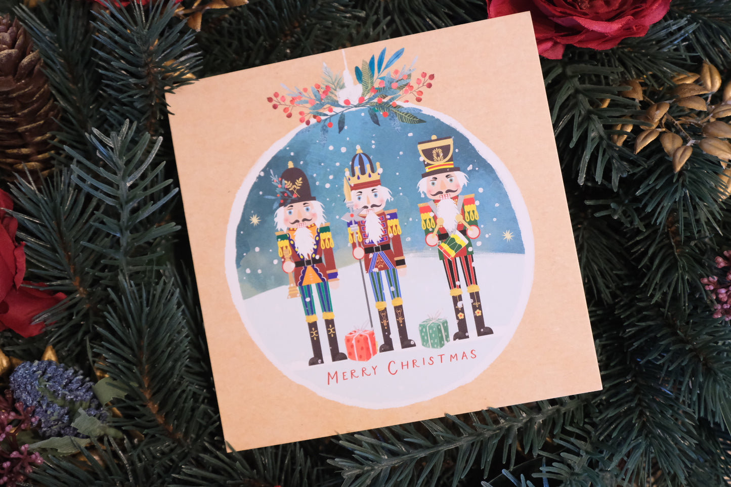 Christmas card with nutcrackers and Christmas trees