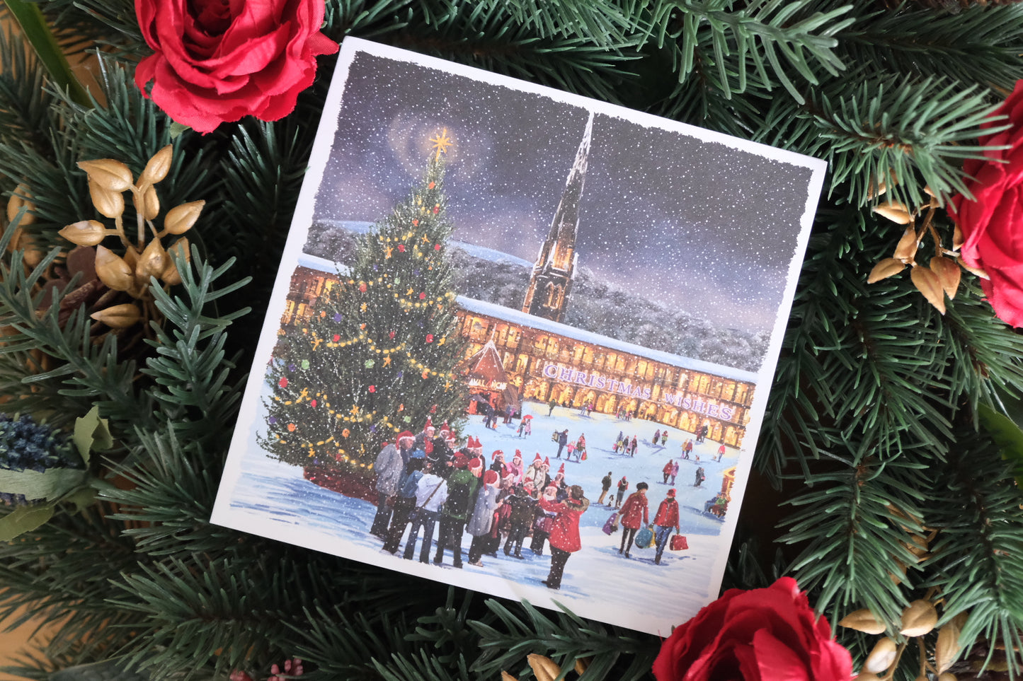Christmas card showing a festive scene at Piece Hall, Halifax