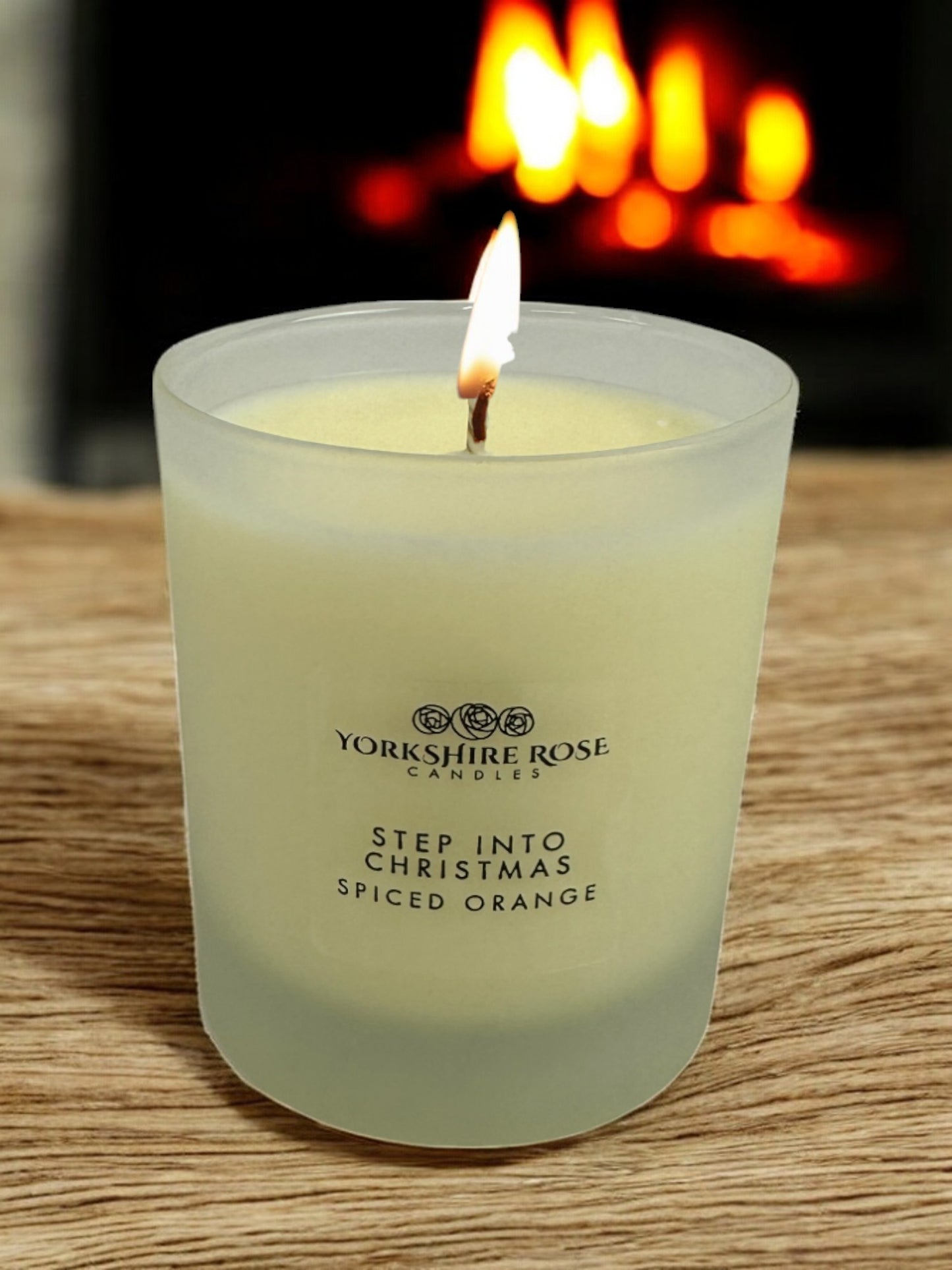 'Step Into Christmas' scented glass candle, by Yorkshire Rose Candles
