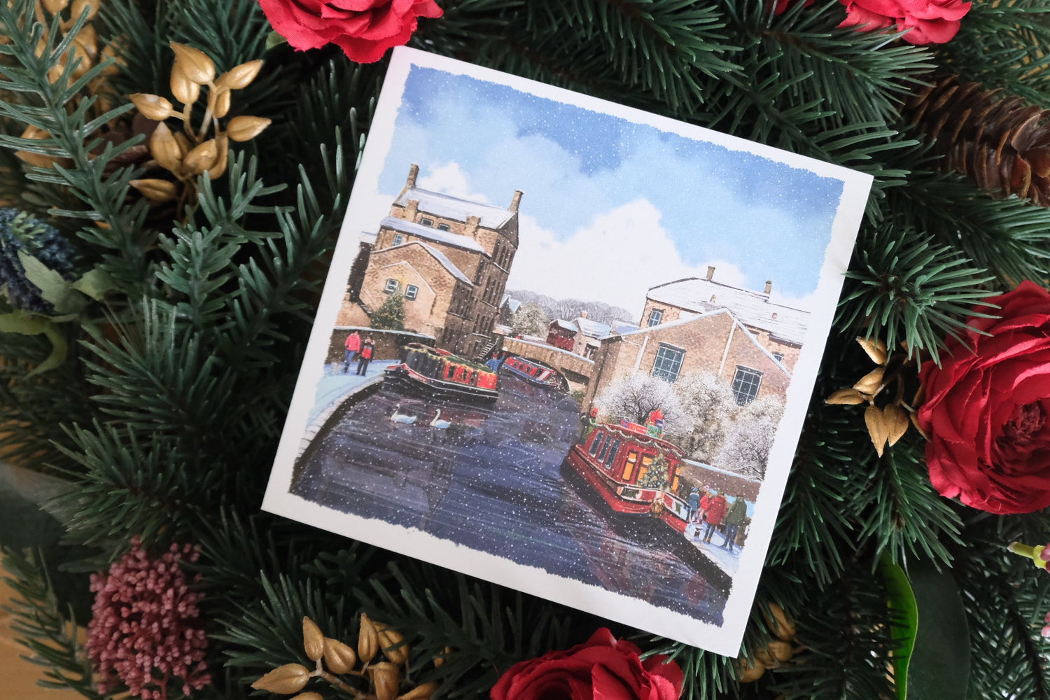 Illustrated snow scene of Skipton canal taken from the front of a Yorkshire Cancer Research Christmas card