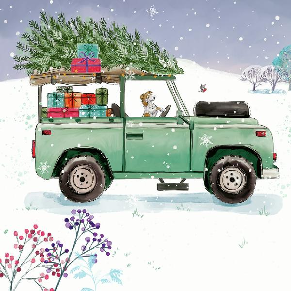 Green vintage truck with Christmas tree and gifts in a snowy landscape