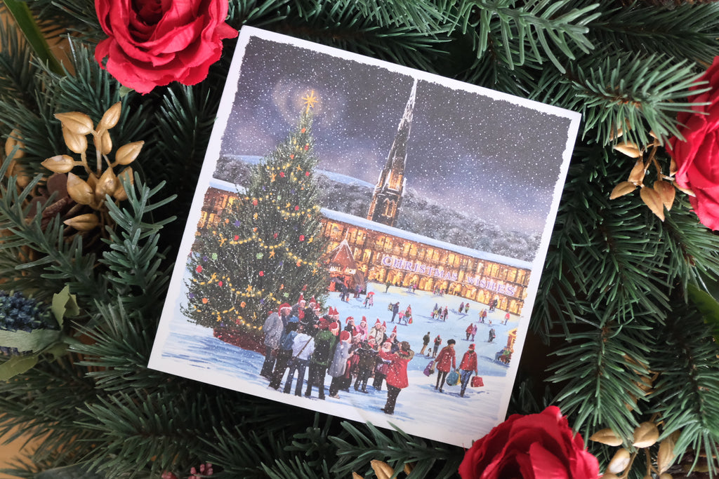 Christmas card showing a festive scene at Piece Hall, Halifax