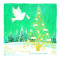 Christmas card with a gold tree, dove, and snowy landscape on a green background